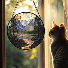 Close-up view of AMDERVEN stained glass suncatcher with intricate patterns