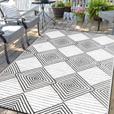 DiiKoo 6x9ft waterproof outdoor rug black and white geometric pattern front view