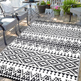 DiiKoo 9x12ft waterproof outdoor rug black and white geometric design front view