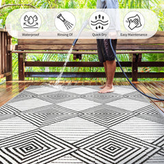 DiiKoo reversible rug displayed in a patio setting