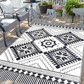 DiiKoo Waterproof Outdoor Rug 5x8ft black and white reversible design front view