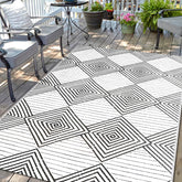 DiiKoo Waterproof Outdoor Rug 5x8ft front view with black and white geometric patterns