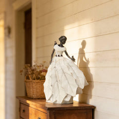 DiliComing Fairy Garden Statue displayed in a garden setting