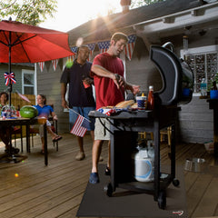 DocSafe grill mat protecting patio floor under charcoal grill
