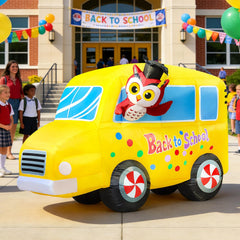 DomKom inflatable school bus in yard during night
