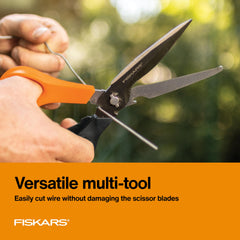 Fiskars 7-in-1 garden scissors showing wire cutter and twine cutter