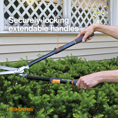 Fiskars extendable hedge shears locked in extended position