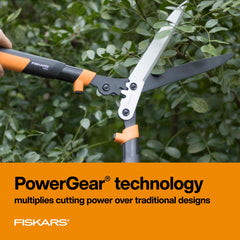 Fiskars PowerGear2 Hedge Shears in use trimming a hedge