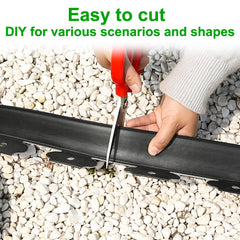 Flexible black plastic garden edging in a garden