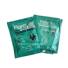 Floralife Flower Food 300 5gm clear powder inside a measuring spoon