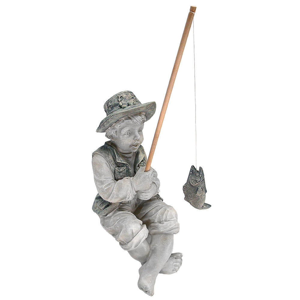 Frederic the Little Fisherman statue front view with fishing pole and fish