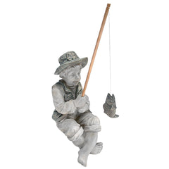 Frederic the Little Fisherman statue front view with fishing pole and fish