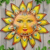 Front view of Daogtc Metal Sun Flower Wall Decor with warm tones