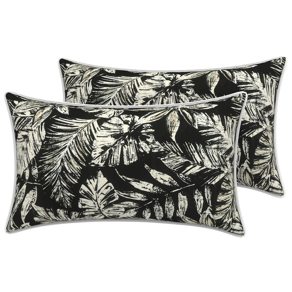Front view of LVTXIII outdoor lumbar pillow cover in Tropical Leaf Black