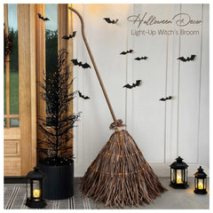 Front view of ORIENTAL CHERRY 5.5 Ft Giant Light-Up Witches Broom with warm white lights