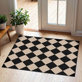 Front view of Othilic indoor outdoor door mat in black and tan checkered pattern