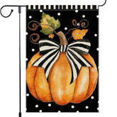 Front view of RMXJKIIU Garden Flag featuring polka dots and pumpkin design