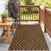 Front view of SAND MINE reversible outdoor rug in black and brown