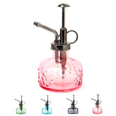 Front view of XXXFLOWER Glass Plant Mister Spray Bottle in pink