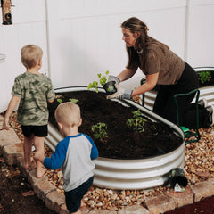 Garden Kneeler & Seat shown in use for planting