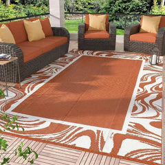 Garvee Outdoor Rug 5x8 front view with modern swirl border design