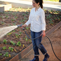 GILMOUR Flexogen garden hose on a garden pathway