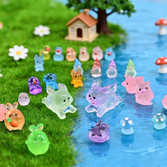 Glow in the dark Prdingfy mini animal figures displayed outdoors
