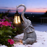 Goodeco 11-inch grey elephant statue with solar lantern