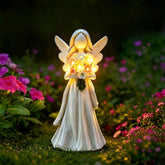 Goodeco Solar Angel Statue front view holding flower bouquet