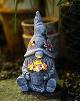Goodeco Solar Sitting Gnome front view with LED flower light