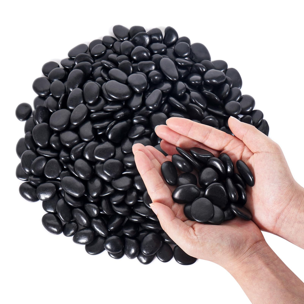 GreatBuddy Black Pebbles 1-2 inch size in a garden setting
