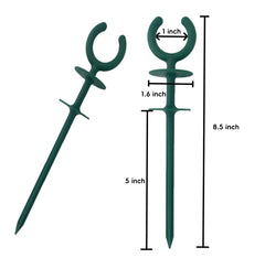 Green garden hose guide stake close-up