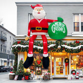 GUDELAK 15FT Climbing Santa Inflatable front view with festive gift bag