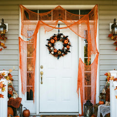 Halloween Creepy Cloth draped over garden decorations
