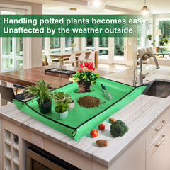HNXTYAOB repotting mat on a table with potted plants