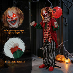 Hourleey clown holding a red skull print balloon in outdoor setting
