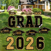 HOVACY 14PCS graduation yard signs displaying GRAD and 2026 in black gold