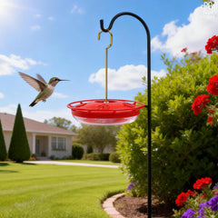 hummingbird feeder showing red colour and feeding ports