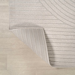 JONATHAN Y Hallie Rug displayed on a patio