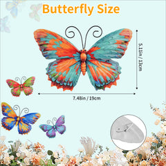 Junware butterfly wall art hanging on a garden fence