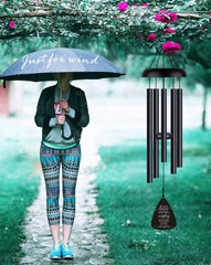 JUST FOR WIND Wind Chimes hanging in a garden setting