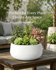 Kante 11-inch white concrete planter on patio