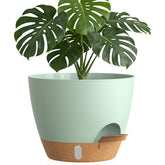 KUGAZ 12 Inch Self Watering Plant Pot front view in green-brown