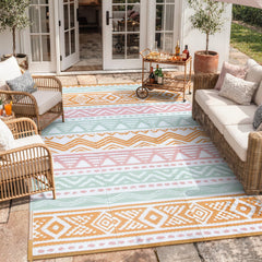 Lahome Outdoor Rug 6x9 front view in pink and orange
