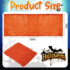 Large orange gauze draped over furniture for Halloween decoration