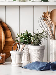 LE TAUCI ceramic pot with embossed design close-up