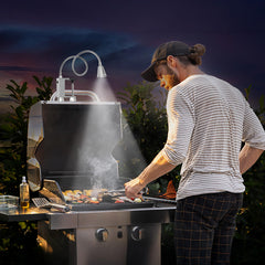 LED Concepts Grill Light with adjustable clamp attached to a grill
