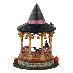Lemax Witch Gazebo Table Accent displayed on a Halloween-themed table