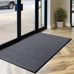 LuxUrux commercial door mat in outdoor setting on patio