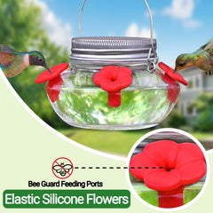 Mason jar hummingbird feeder hanging in a garden